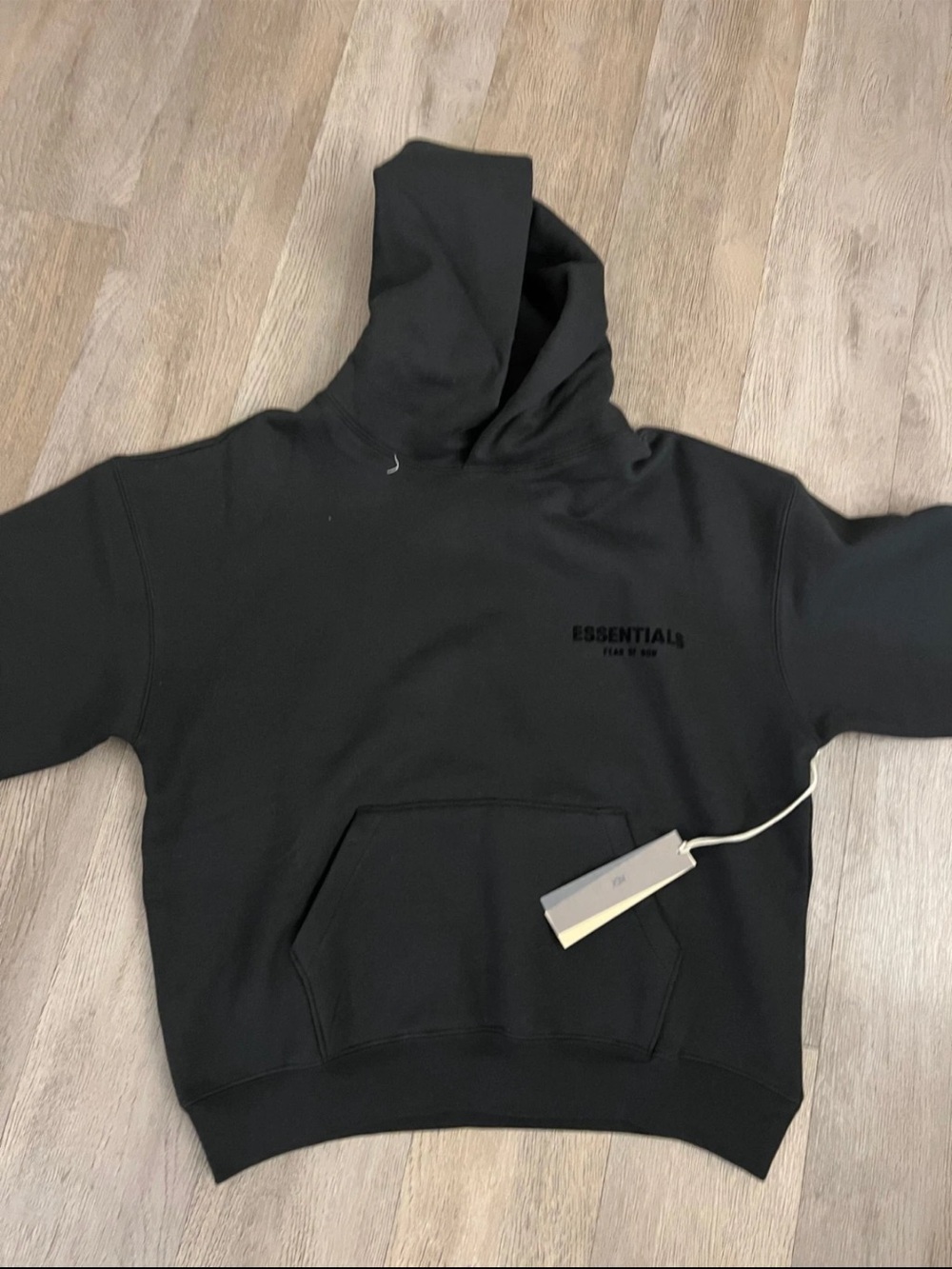 Essentials Men’s Black Pullover Hoodie with Subtle Chest Logo